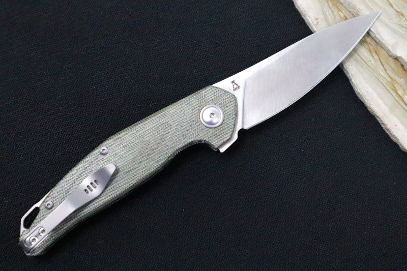 Maniago Knife Makers Goccia - Drop Point Blade / M390 Steel / Green Canvas Micarta Handle / Sandblasted Titanium Backspacer