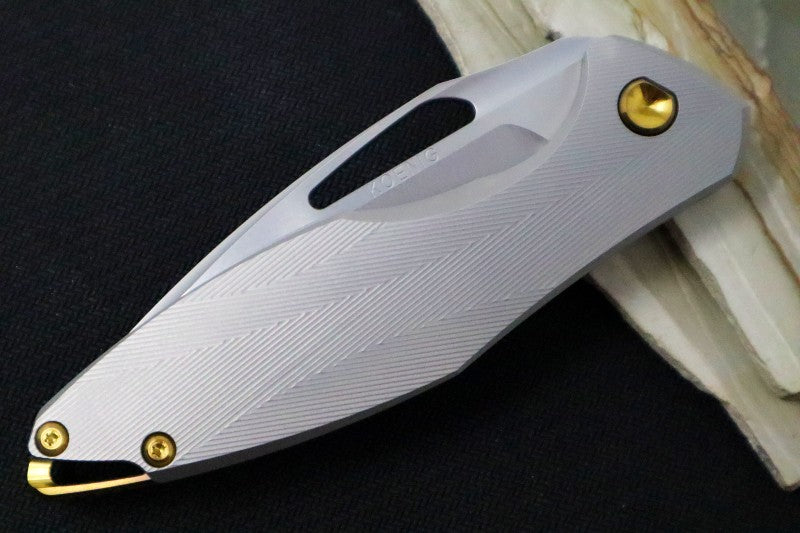 Koenig Arius Flipper Delete- Burnished Blade w/ Polished Flats - Patterned Titanium Handle - Bronze Accents (Gen 4) AR21211331