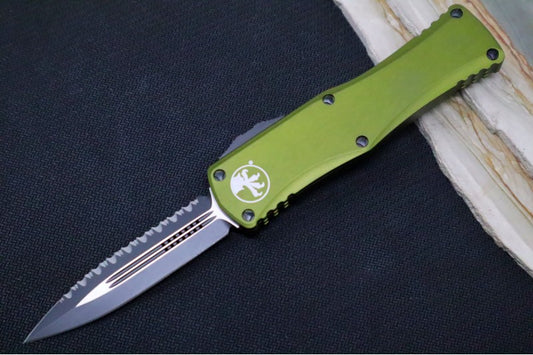 Microtech Hera OTF - Double Edge / Black Blade with Full Serrate / OD Green Aluminum Handle 702-3OD