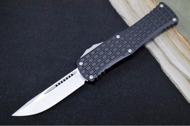 Microtech Hera Signature Series OTF - Stonewashed Finish / Single Edge Style / Black Aluminum Handle with Frag Pattern 703-10FRS