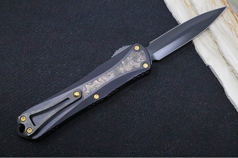 Heretic Knives Manticore E OTF - Black DLC Finish / Dagger Blade / Black Anodized Aluminum & Gold Dunes Fat Carbon Fiber Handle H028-6A-FC/TiN