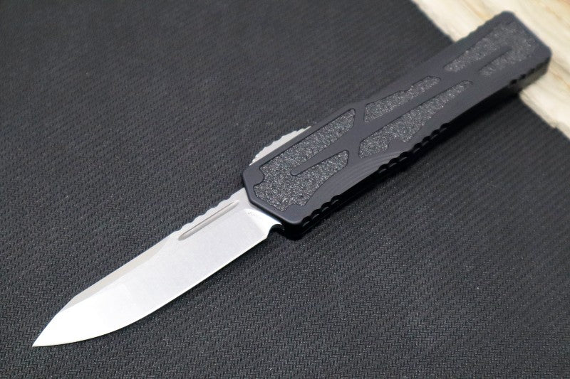 Heretic Knives Colossus OTF - Stonewash Magnacut Drop Point Blade / Black Anodized Handle w/ Integrated Grip Tape H039-2A - Northwest Knives