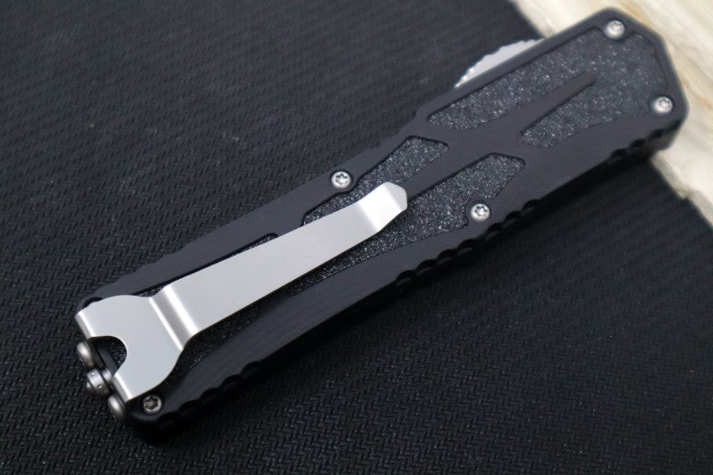 Heretic Knives Colossus OTF - Stonewash Magnacut Serrated Drop Point Blade / Black Anodized Handle w/ Integrated Grip Tape H039-2B