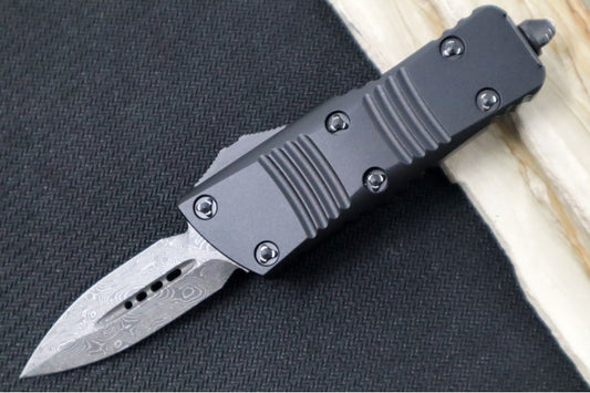 Microtech Mini Troodon OTF Signature Series - Damascus Steel / Dagger Blade /  Black Handle & Ringed Hardware 238-16S