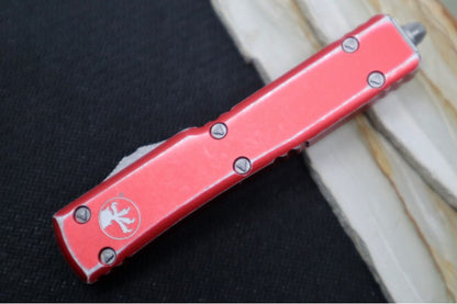 Microtech UTX-70 OTF - Distressed Red Handle / Apocalyptic Finish / Full Serrated Dagger Blade - 147-D12DRD